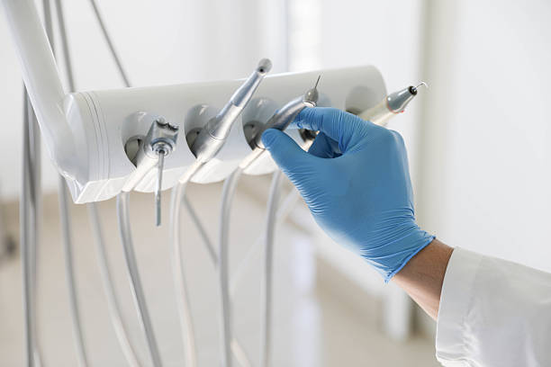 Professional Tooth Extraction technician working in Lewisville, TX